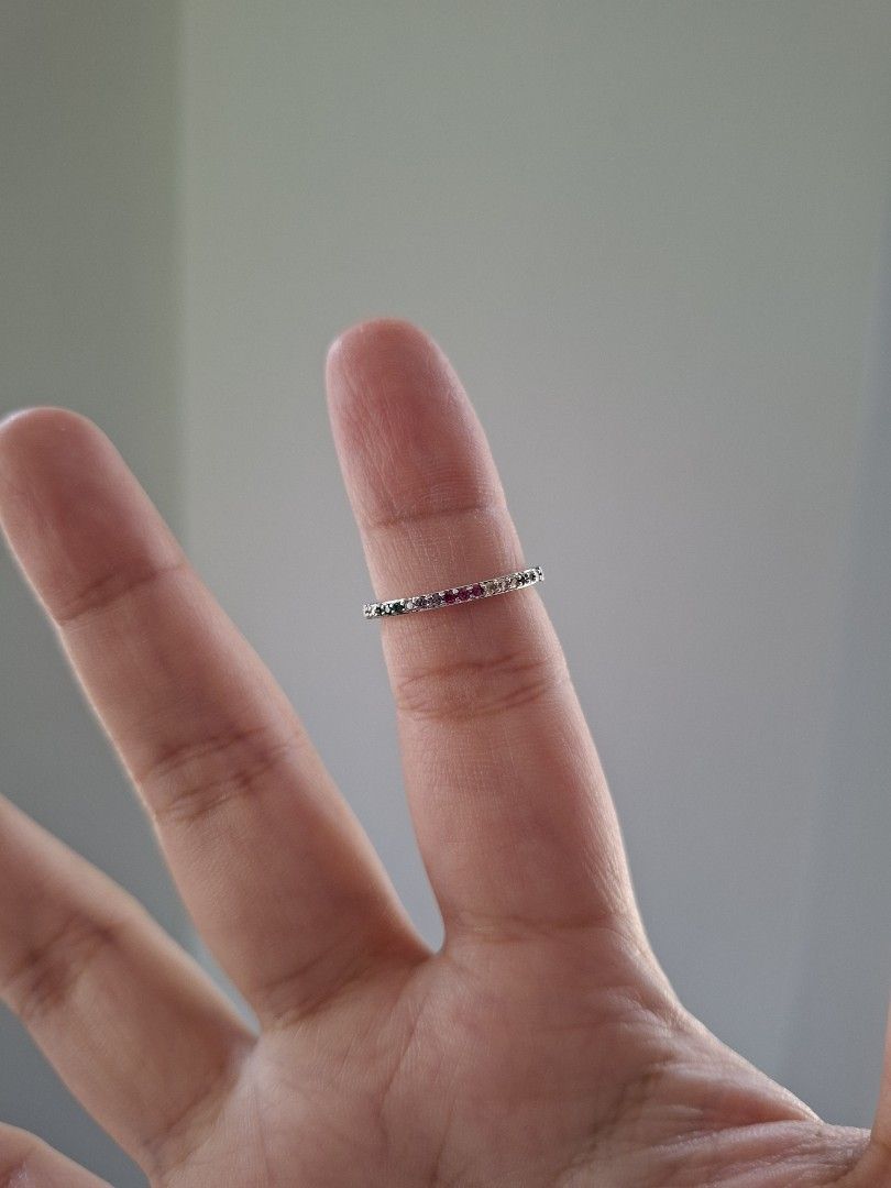 Simple Rainbow Muticolor Stones Eternity Ring Silver Size 7 (Category: Rings) located in Dasmarinas. Submitted by danabrie22 (Listing ID 1463450683, Image 2). Description: size 7 very well-made, excellent crafstmanship 10/10 condition brand new stainless steel & colored cubic zirconia stones made in Hongkong.