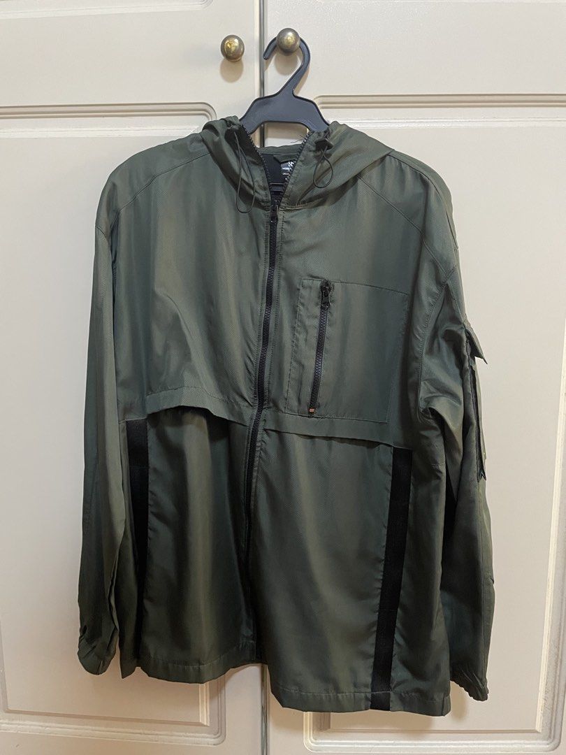 SNK ATK green wind breaker jacket (Category: Coats, Jackets and Outerwear) located in Makati City. Submitted by crisbeooo (Listing ID 1463377508, Image 1). Description: Size L SNK ATK collab with Mobile Legends Bang Bang With 4 pockets Used for a few times, no issues.