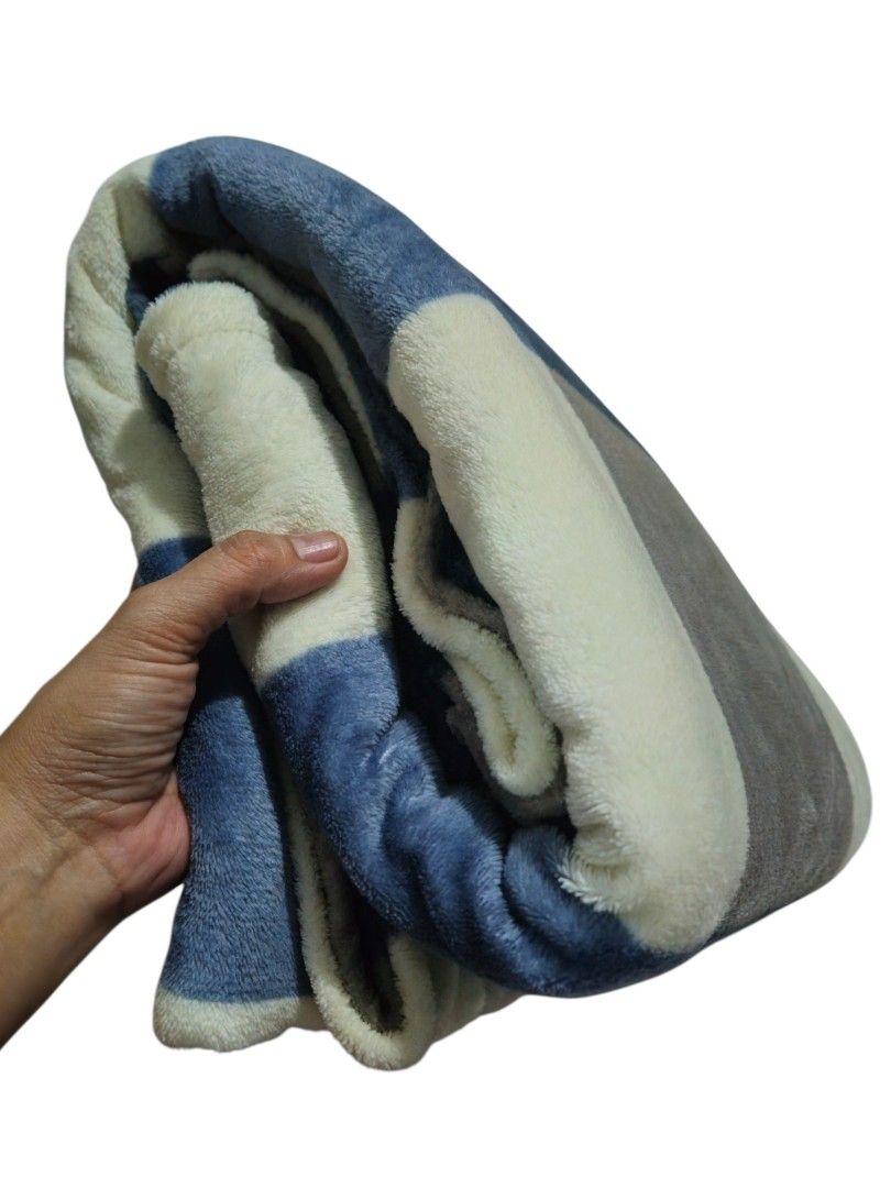 Soft Plaid Fleece Blanket (Category: Bedding & Towels) located in Quezon City. Submitted by kirstenbella (Listing ID 1463336710, Image 2). Description: - Super soft and thick fluffy - Perfect for snuggling - Cozy plaid bed blanket - Colors: Cream, Grey, and Blue - Queen size - Washed once, but never really used - From US.