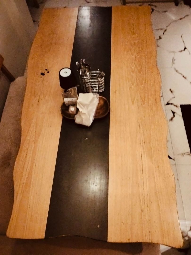 Solid wood dining/conference table with Black Inlay and Modern Legs (Category: Tables & Sets) located in Pasig City. Submitted by germainepatdu (Listing ID 1463364645, Image 3). Description: Solid wood live edge dining table with black inlay. Black legs with gold accents. Seats many. Unique dining table. good conference table too. up to 8 people. Price negotiable for sure buyers. dimension: depth: (short part)85cm (long part)100cm length: 189 cm 