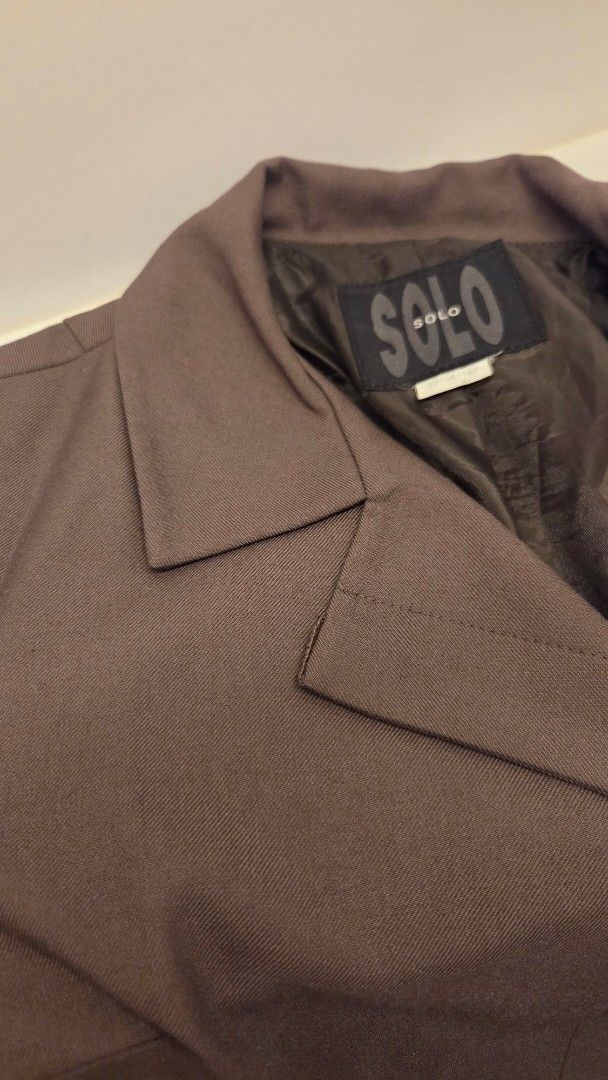SOLO Brown Trench Coat (Category: Coats, Jackets and Outerwear) located in Mandaluyong City. Submitted by loijiminigo (Listing ID 1463453555, Image 3). Description: - SOLO brown blazer - Classic lapel design - Standard fit - Ideal for smart casual or work wear - Simple and versatile.
