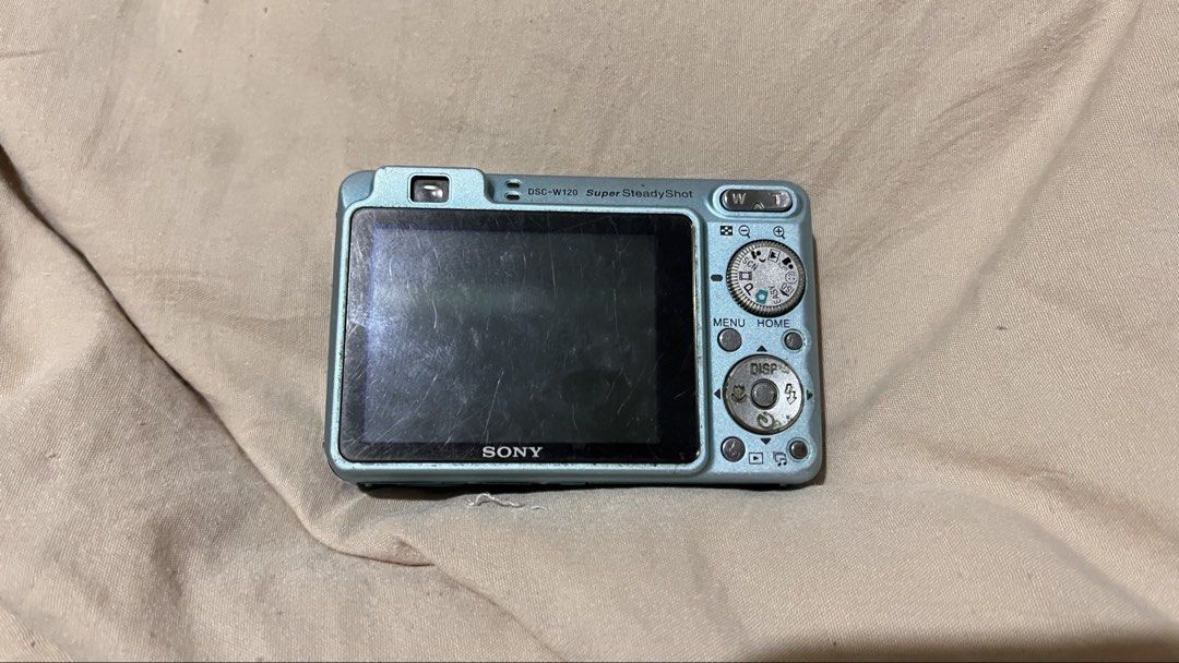 Sony Cyber-shot DSC-W120 (Category: Cameras) located in Bayambang. Submitted by acceeejwk (Listing ID 1463492549, Image 2). Description: FOR SALE‼️ - Light blue Sony Cyber-shot DSC-W120 camera - 7.2 Megapixel resolution - Super SteadyShot feature for blur-free photos - Screen has some visible scratches, but fully functional - Ideal for quick and easy snapshots Issues🥹: - No flash (red flash lang nagana) still repairable sadyang wala lang dito sa