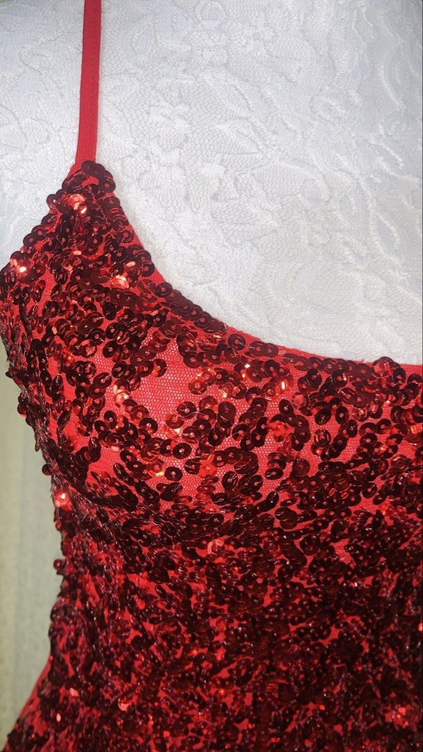 Sparkly Red Sequin Tank Top Camisole (Category: Sleeveless) located in Dagupan City. Submitted by sj_styles0910. (Listing ID 1463533125, Image 3). Description: - Stunning red sequin tank top - Delicate spaghetti straps - Fully sequined front for maximum sparkle - Solid red back with a subtle sheen - Ideal for parties, nights out, or any occasion needing glamour - Designed to catch the light beautifully - Comfortable for all-night wear.