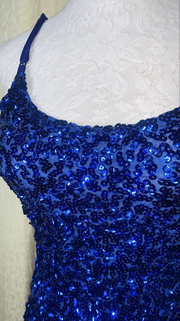 Sparkly Royal Blue Sequin Camisole Top (Category: Sleeveless) located in Dagupan City. Submitted by sj_styles0910. (Listing ID 1463533037, Image 2). Description: - Stunning royal blue camisole - Covered in dazzling sequins - Features adjustable straps for a perfect fit - Comfortable soft mesh lining underneath - Ideal for parties, nights out, or any occasion where you want to shine - Catches the light beautifully, ensuring you stand out.