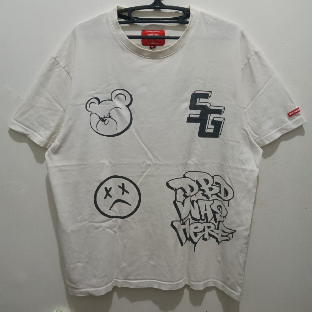 SPRAYGROUND Graphic Shirt (Category: Tshirts & Polo Shirts ) located in Caloocan City. Submitted by jaychingsss (Listing ID 1463490398, Image 1). Description: Sprayground Graphic Shirt - 100 23x28 Complete Tags NEED WASH.