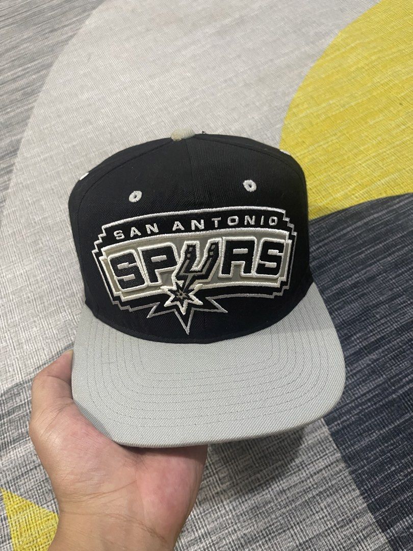 Spurs mitchell n ness snapback hat (Category: Caps & Hats) located in Taytay. Submitted by ekselentekondisyon (Listing ID 1463473481, Image 1). Description: Spurs snapback hat By mitchell n ness Need wash and cleaning May kalawang under button Bawal sa maselan Acrylic/wool material .