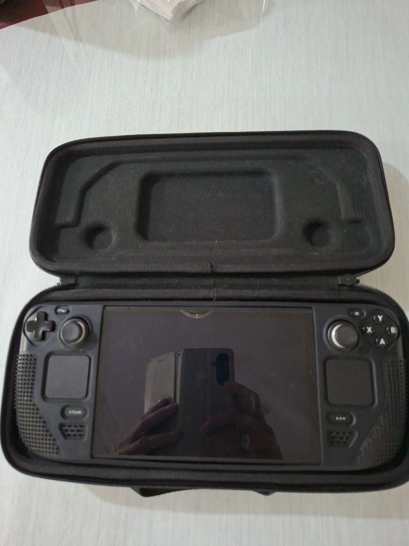 Steam Deck 512gb + 1tb SanDisk gameplay (Category: Others) located in Marikina City. Submitted by yoh6781 (Listing ID 1463404605, Image 1). Description: comes with rubber grip, carry case, box and 1tb SanDisk gameplay microsd.