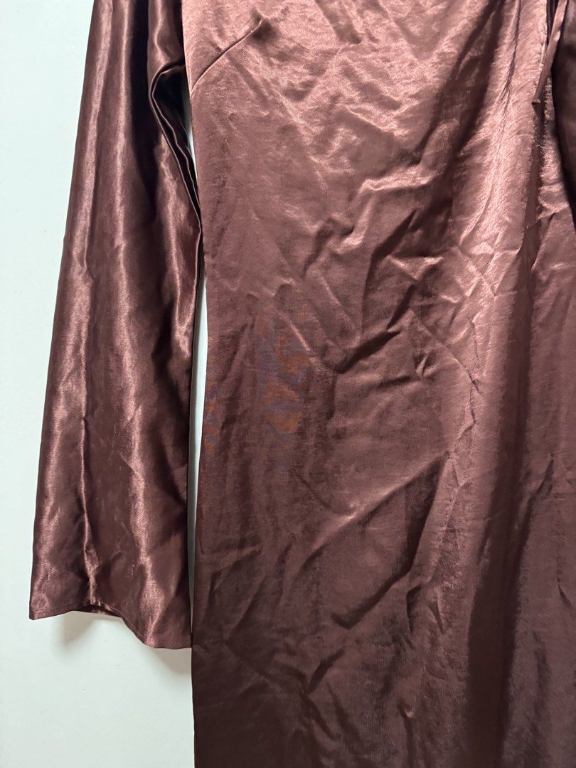 Stella Two Way Long Gown - Satin Brown (Category: Evening dresses & gowns) located in Manila. Submitted by anyabananana (Listing ID 1463399716, Image 3). Description: - Rich brown satin long gown - Unique one-shoulder design with tie details - Long sleeves Never worn Fits small.