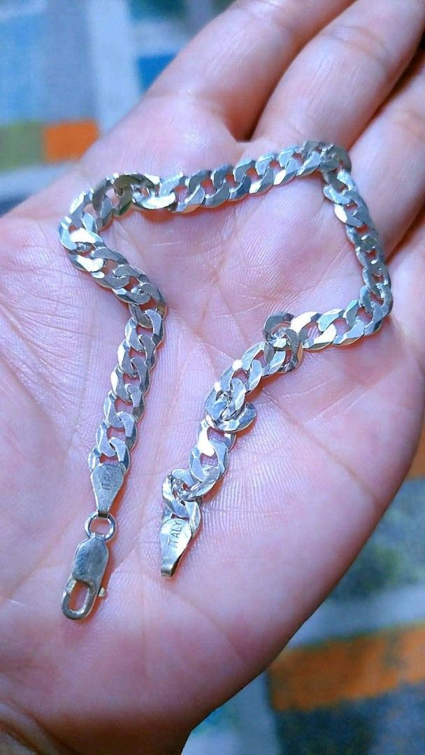Sterling Silver Curb Chain Bracelet "ITALY" (Category: Bracelets) located in Baliuag. Submitted by marieannfernando23 (Listing ID 1463473075, Image 1). Description: - Sterling silver curb chain bracelet - Secure lobster clasp closure - Stamped "ITALY" - 7.8 grams slim type - up to 10" .