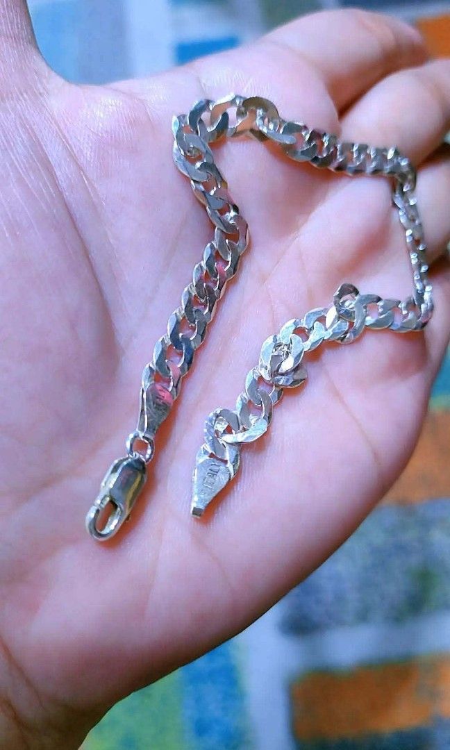 Sterling Silver Curb Chain Bracelet "ITALY" (Category: Bracelets) located in Baliuag. Submitted by marieannfernando23 (Listing ID 1463473075, Image 2). Description: - Sterling silver curb chain bracelet - Secure lobster clasp closure - Stamped "ITALY" - 7.8 grams slim type - up to 10" .