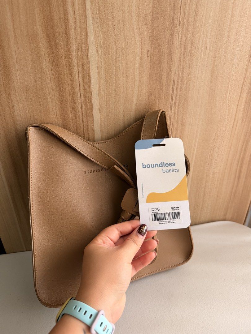 Straightforward Boundless Basics Sling Bag - Beige (Category: Cross-body Bags) located in Manila. Submitted by mondaymom (Listing ID 1463370421, Image 3). Description: - Brand: Boundless Basics - Color: Beige - Style: Chic sling bag - Features: Adjustable strap - Ideal for: Everyday use - Condition: Comes with original tag - Measurements: Approx. 23cm (Width) x 26cm (Height).