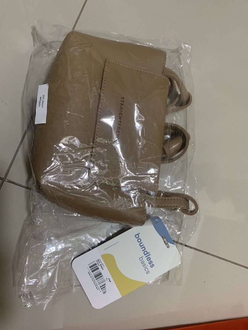 Straightforward Boundless Basics Tote Bag (Category: Tote Bags) located in Cavite. Submitted by schnauzerthecutie (Listing ID 1463509418, Image 2). Description: - Straightforward Boundless Basics tote bag - Color: Taupe - Condition: Brand new, in original packaging - Includes: Orange Straightforward reusable bag - Ideal for: Everyday use.
