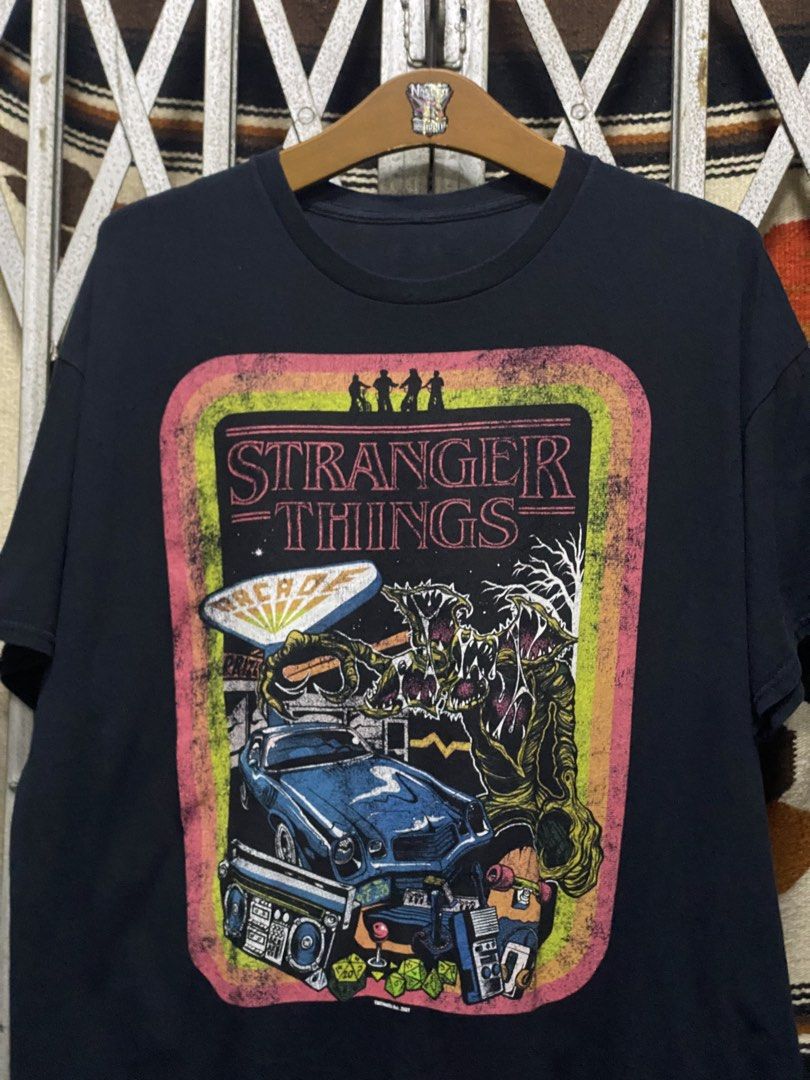 Stranger Things (Category: Tshirts & Polo Shirts) located in Hulu Langat. Submitted by buntilnostrasupply (Listing ID 1463410055, Image 1). Description: Size (pit23.5❌labuh29.5) Tag Detail Missing Condisi 9/10 Harga termasuk pos.