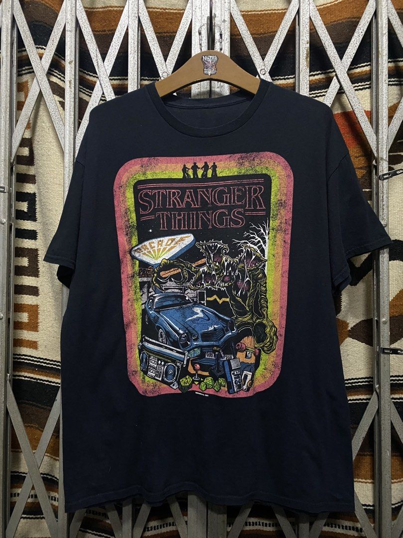 Stranger Things (Category: Tshirts & Polo Shirts) located in Hulu Langat. Submitted by buntilnostrasupply (Listing ID 1463410055, Image 2). Description: Size (pit23.5❌labuh29.5) Tag Detail Missing Condisi 9/10 Harga termasuk pos.