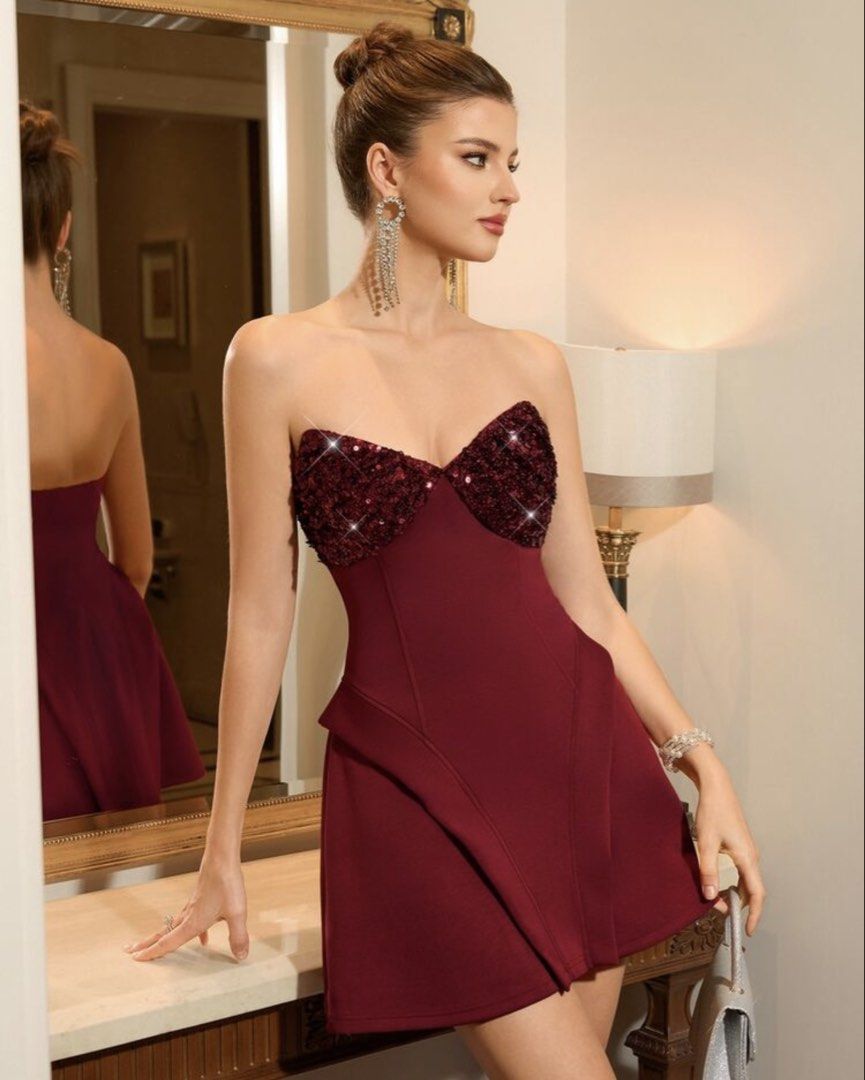 Strapless Sequin Bodice Mini Dress (Category: Dresses) located in Quezon City. Submitted by sanda.cc (Listing ID 1463378087, Image 1). Description: - Burgundy strapless mini dress - Sequin sweetheart neckline - Structured bodice - A-line skirt with subtle paneling - Ideal for parties and events - Shines beautifully under lights.
