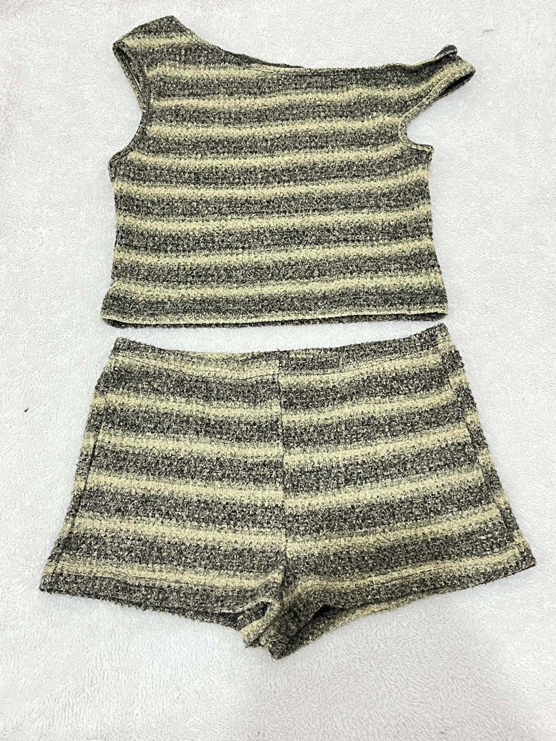 Striped Knit Top and Shorts Set (Category: Sets or Coordinates) located in Malolos. Submitted by vanderwoodsen_ (Listing ID 1463424646, Image 1). Description: - Cute striped knit set - Includes one-shoulder top and matching shorts - Features a nice textured fabric - Ideal for casual wear or beach vacations - Versatile for mixing and matching with other clothes - Comfortable and stylish.