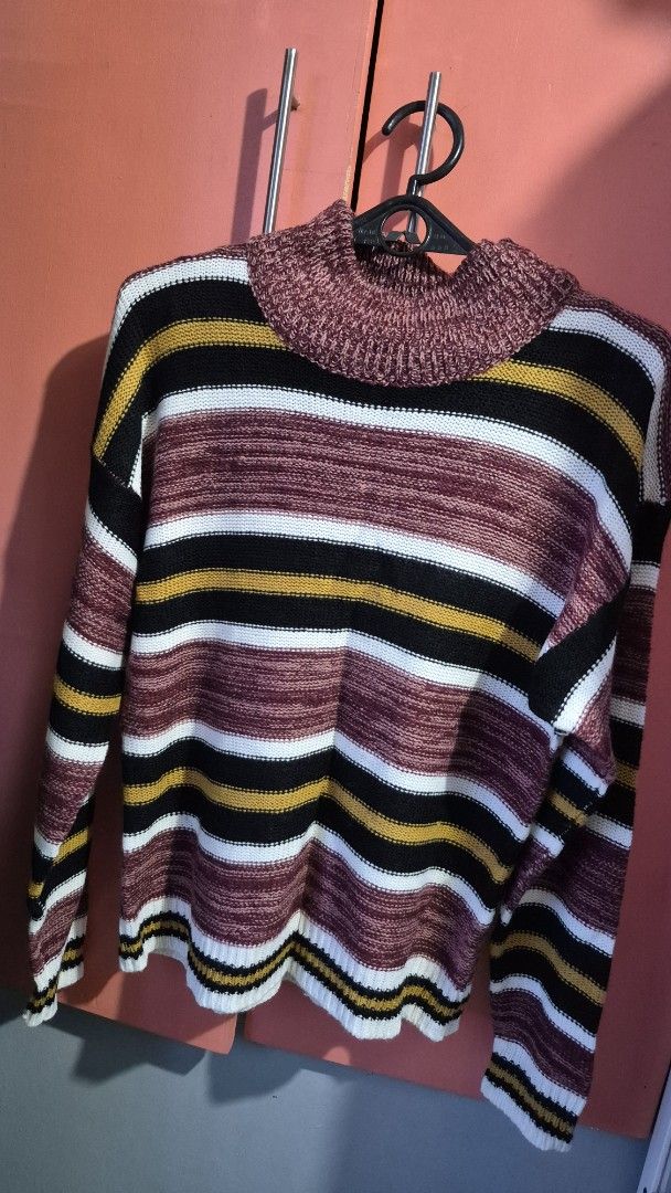 Striped Turtleneck Sweater (Category: Longsleeves) located in Imus. Submitted by shopestepanimey (Listing ID 1463429922, Image 1). Description: - Cozy striped turtleneck sweater - Features maroon, black, white, and yellow stripes - Washed hut never worn.