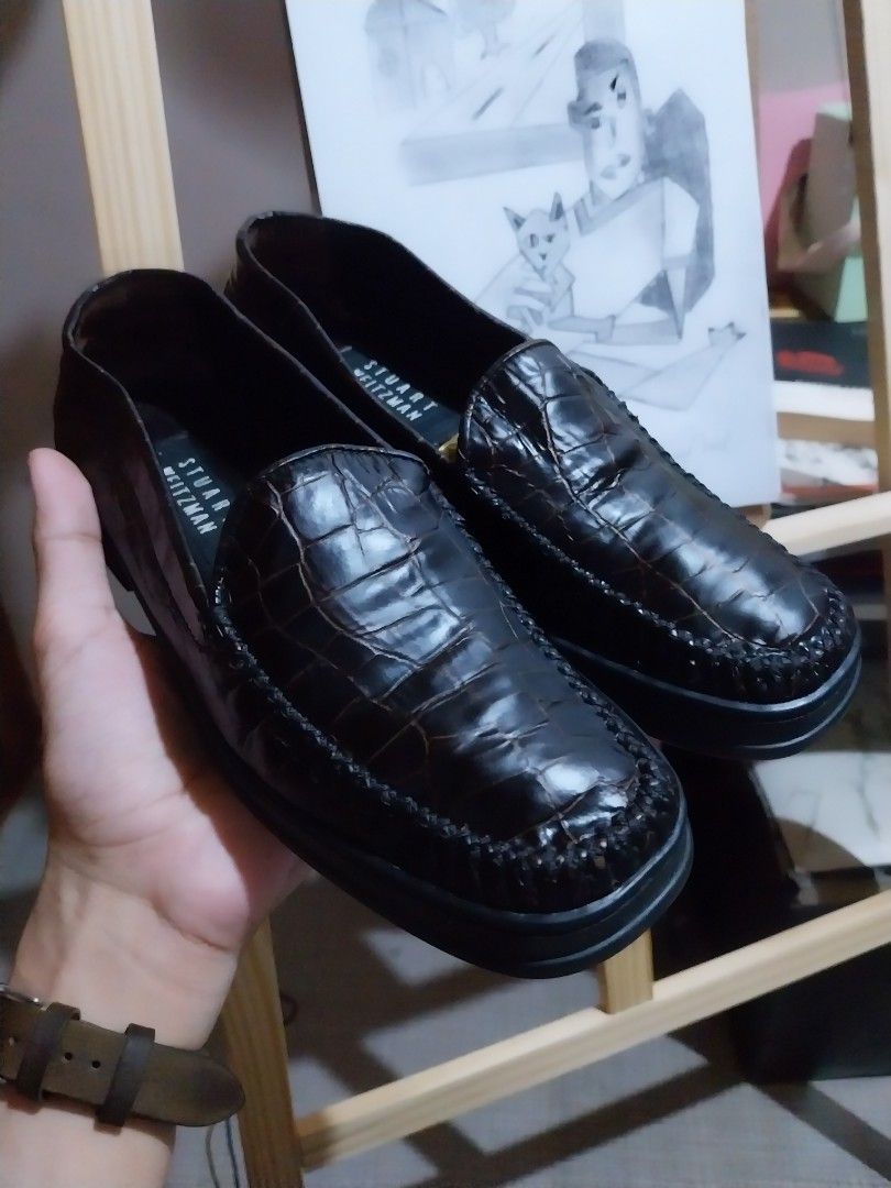 Stuart Weitzman Crocodile Embossed Loafers (Category: Loafers) located in Manila. Submitted by j.dlh (Listing ID 1463359701, Image 1). Description: - Dark brown Stuart Weitzman loafers - Size 6½ - Not used - Crocodile embossed pattern on uppers - Classic slip-on style - Chunky lug sole for excellent grip - Made in Spain - Perfect for dressing up or down.
