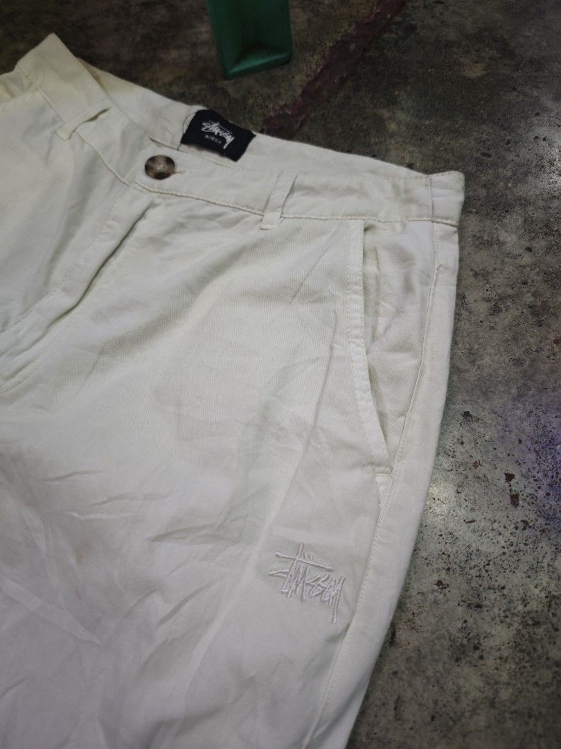 Stussy Cargo Pants Off White/ Cream White (Category: Joggers) located in Dalaguete. Submitted by three7archives (Listing ID 1463435124, Image 2). Description: - Stussy beige cargo pants - Classic cargo style with multiple pockets - Embroidered Stussy logo on the leg - Button closure at the waist - Made in China - Material: Cotton PS Need Wash.