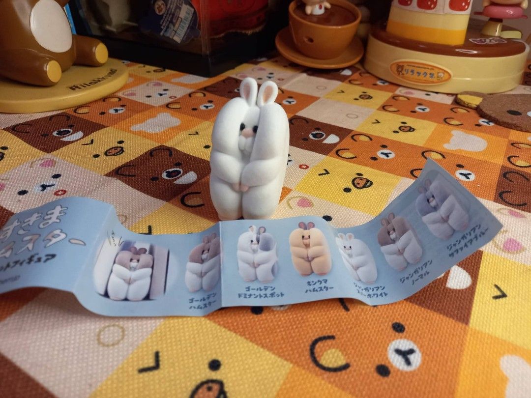 Sukima hamster gashapon (Category: Designer & Blind Box Toys) located in Bulacan. Submitted by arax_kumashop (Listing ID 1463529110, Image 1). Description: - mabigat bigat - White bunny variant - Includes original packaging insert showing other variants .