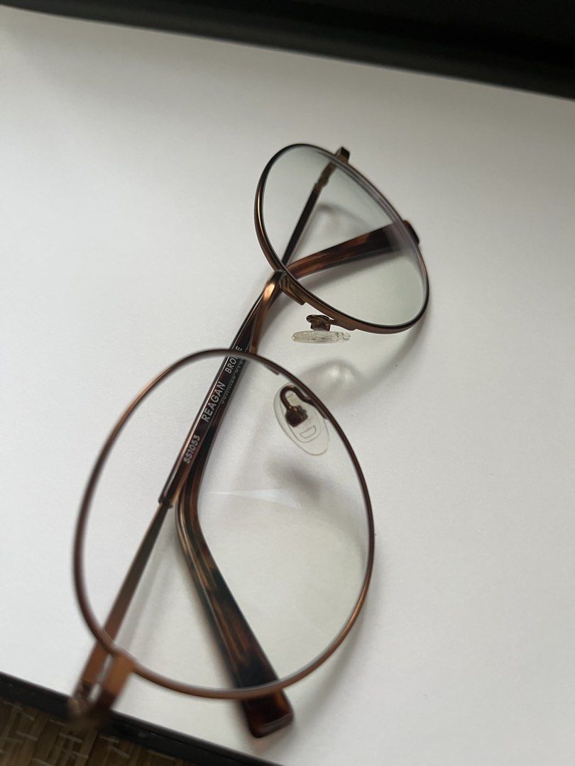 Sunnies Reagan Round Bronze Eyeglasses Frame (Category: Sunglasses & Eyewear) located in Pasig City. Submitted by A7closet (Listing ID 1463365708, Image 2). Description: - Classic round eyeglass frames in a stylish bronze color. - Features temples with a sophisticated tortoiseshell pattern. - Lightweight design for comfortable all-day wear. - Sold as frames only; ready for your optician to fit prescription lenses..
