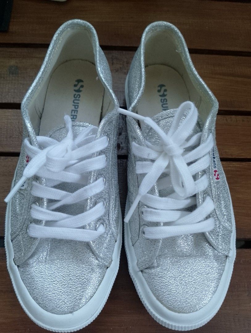 SUPERGA 2750 LAMEW SILVER METALLIC Sneakers (Category: Sneakers) located in Cabadbaran. Submitted by ztsfinds (Listing ID 1463403330, Image 2). Description: Add a touch of effortless Italian glamour to your everyday style with these pre-loved Superga 2750 Lamew sneakers. This pair features a stunning silver canvas upper woven with metallic lamé threads that offer a gorgeous, eye-catching shimmer. Built with Superga's signature timeless low-top si