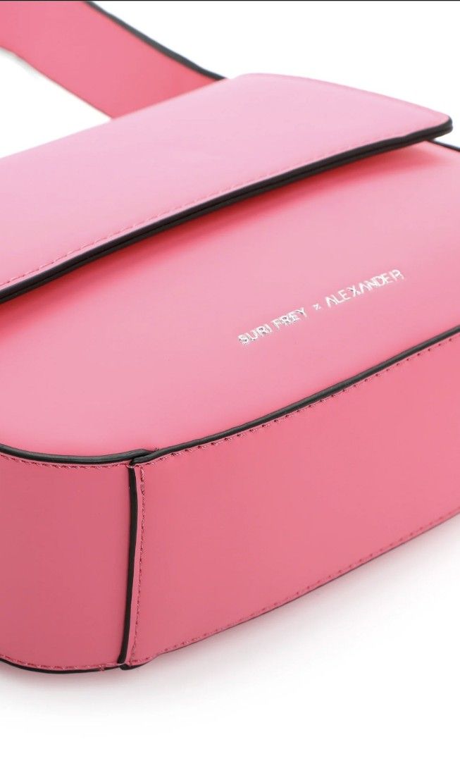 Suri Frey x Alexander Pink Shoulder Bag (Category: Luxury Bags & Wallets) located in Manila. Submitted by vsballeras1984 (Listing ID 1463511338, Image 2). Description: - Super cute pink shoulder bag - Collaboration: Suri Frey x Alexander - Eye-catching bright color - Secure top flap closure - Includes a long, adjustable strap - Versatile: Great for everyday or a night out - Features a clean and simple design.