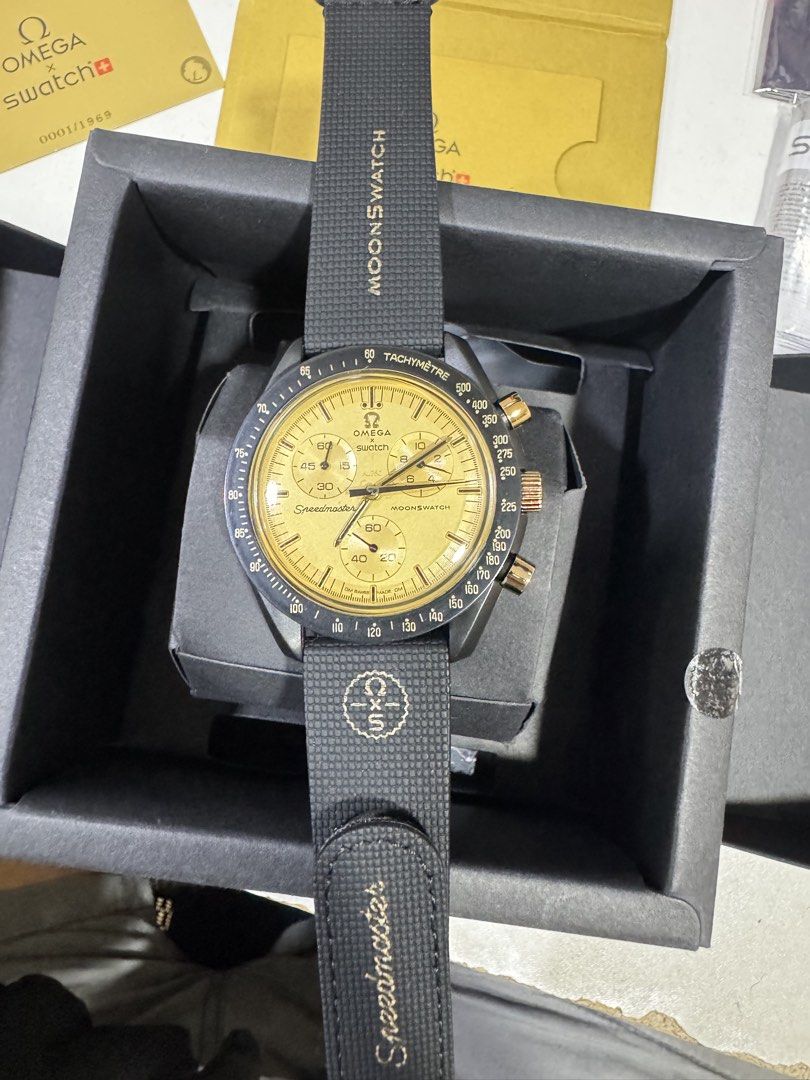 Swatch Omega 1969 (Category: Men's Watches) located in Manila. Submitted by john_emerson (Listing ID 1463504997, Image 1). Description: Swatch Omega 1969 R3plic@ Complete with box, manuals and paper bags.