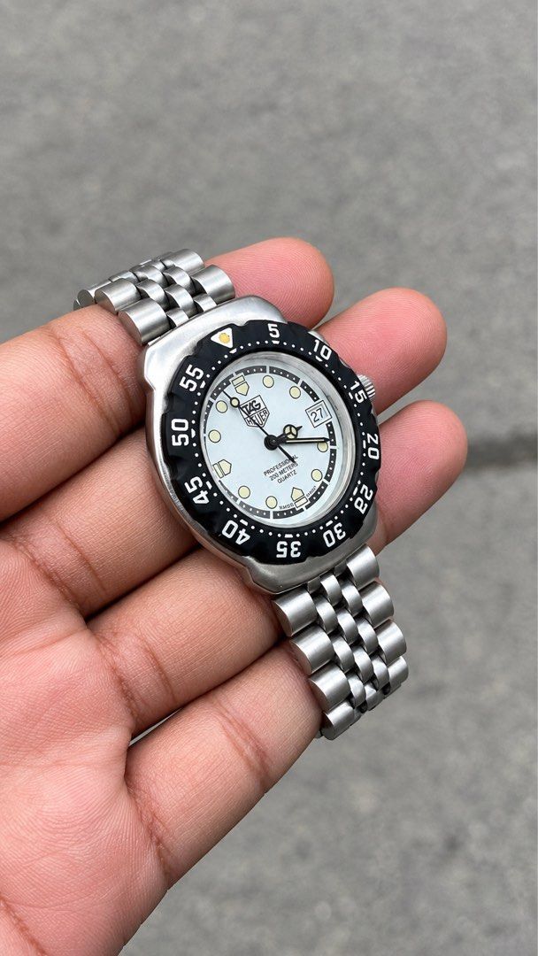 TAG Heuer Formula 1 Classic “Panda” Mens (Category: Men's Watches) located in Caloocan City. Submitted by _alennchan (Listing ID 1463514277, Image 3). Description: TAG Heuer Formula 1 Classic “Panda” Mens - WA1218 - Condition: 9.8/10 - No issue/ Mint condition - Up to 8.5 Wrist Size - Case size approx 36mm - Rotating bezzel - Quartz Movement - Comes with replacement box - Money back if provenfake x10 Inclusions: Inner box, Outer Box, Unit, Manual