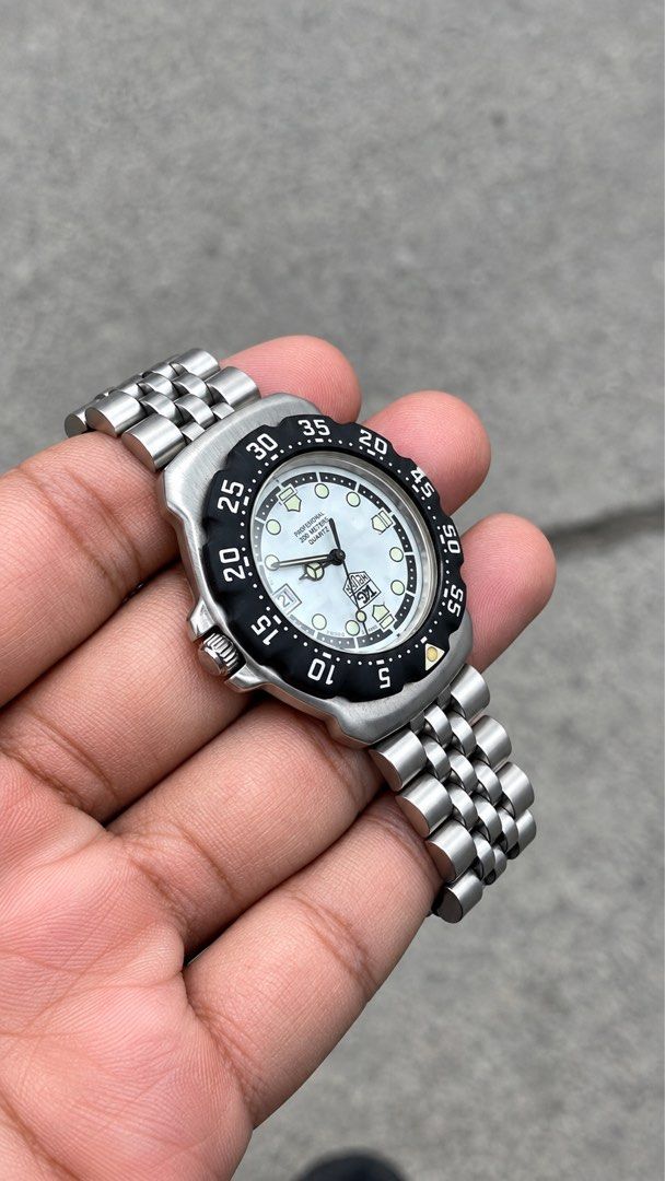 TAG Heuer Formula 1 Classic “Panda” Mens (Category: Men's Watches) located in Caloocan City. Submitted by _alennchan (Listing ID 1463514277, Image 2). Description: TAG Heuer Formula 1 Classic “Panda” Mens - WA1218 - Condition: 9.8/10 - No issue/ Mint condition - Up to 8.5 Wrist Size - Case size approx 36mm - Rotating bezzel - Quartz Movement - Comes with replacement box - Money back if provenfake x10 Inclusions: Inner box, Outer Box, Unit, Manual