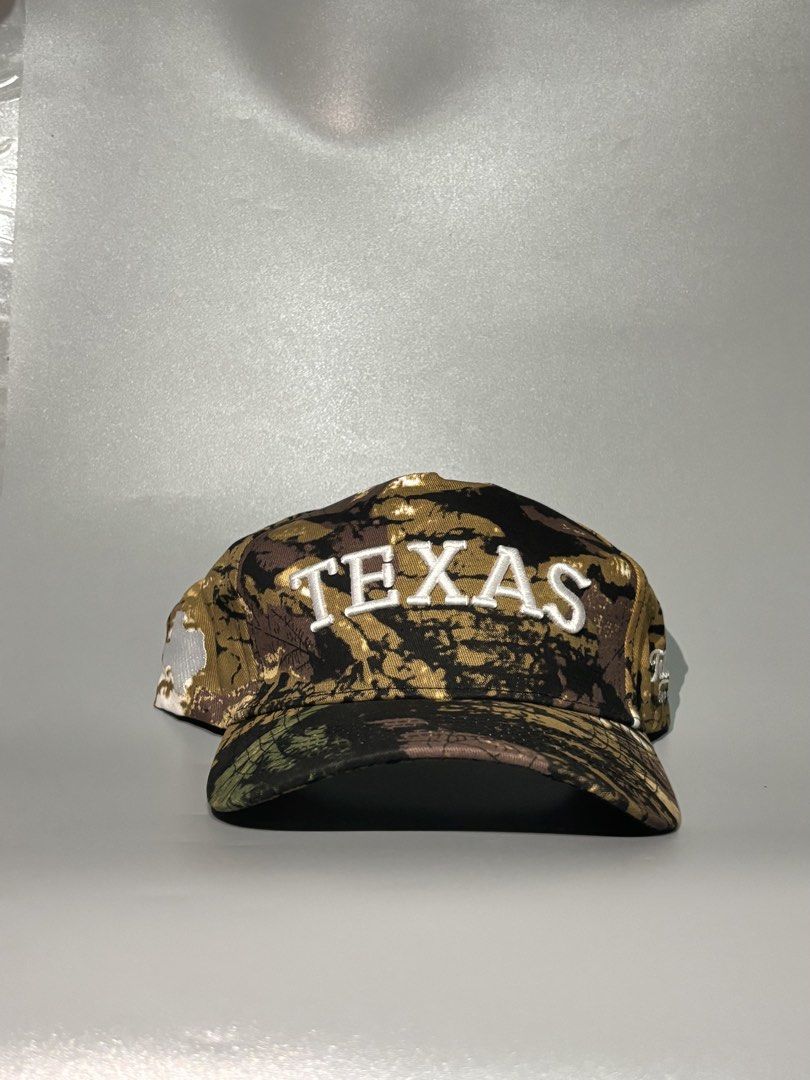 Tailspin Supply Co. Texas Camo Baseball Cap (Category: Caps & Hats) located in Manila. Submitted by gilmorecapz (Listing ID 1463442014, Image 1). Description: - Authentic Tailspin Supply Co. Texas cap - Stylish camouflage pattern - 'TEXAS' embroidered on the front - Proudly made in Austin, Texas - Adjustable strap for a comfortable, custom fit - Ideal for any Texas enthusiast or fan.