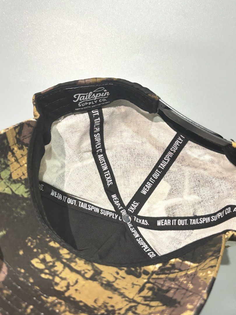 Tailspin Supply Co. Texas Camo Baseball Cap (Category: Caps & Hats) located in Manila. Submitted by gilmorecapz (Listing ID 1463442014, Image 3). Description: - Authentic Tailspin Supply Co. Texas cap - Stylish camouflage pattern - 'TEXAS' embroidered on the front - Proudly made in Austin, Texas - Adjustable strap for a comfortable, custom fit - Ideal for any Texas enthusiast or fan.