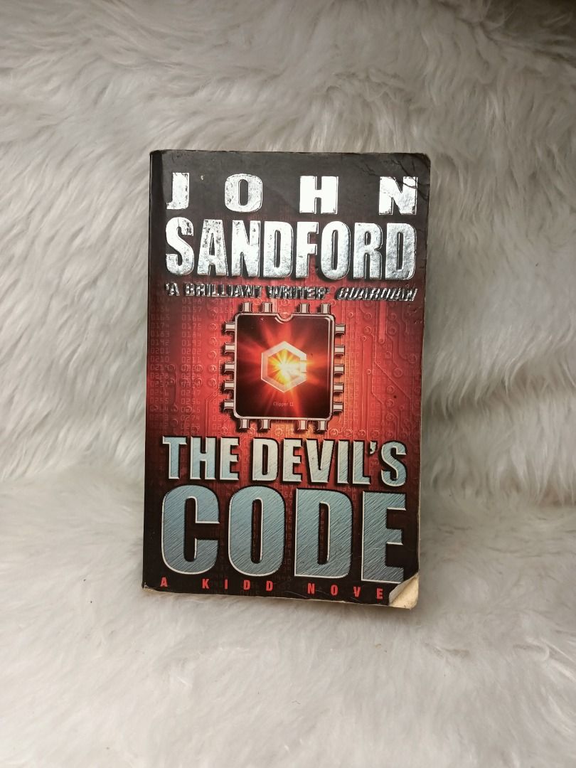 The Devil's Code by John Sandford - A Kidd Novel (Category: Storybooks) located in Tumauini. Submitted by qeynichi (Listing ID 1463327132, Image 1). Description: - Thriller novel by John Sandford - Title: 'The Devil's Code' (Kidd novel) - Plot: Conspiracy at the highest levels - Genre: Vintage thriller, suspense - Condition: Public domain, great read.