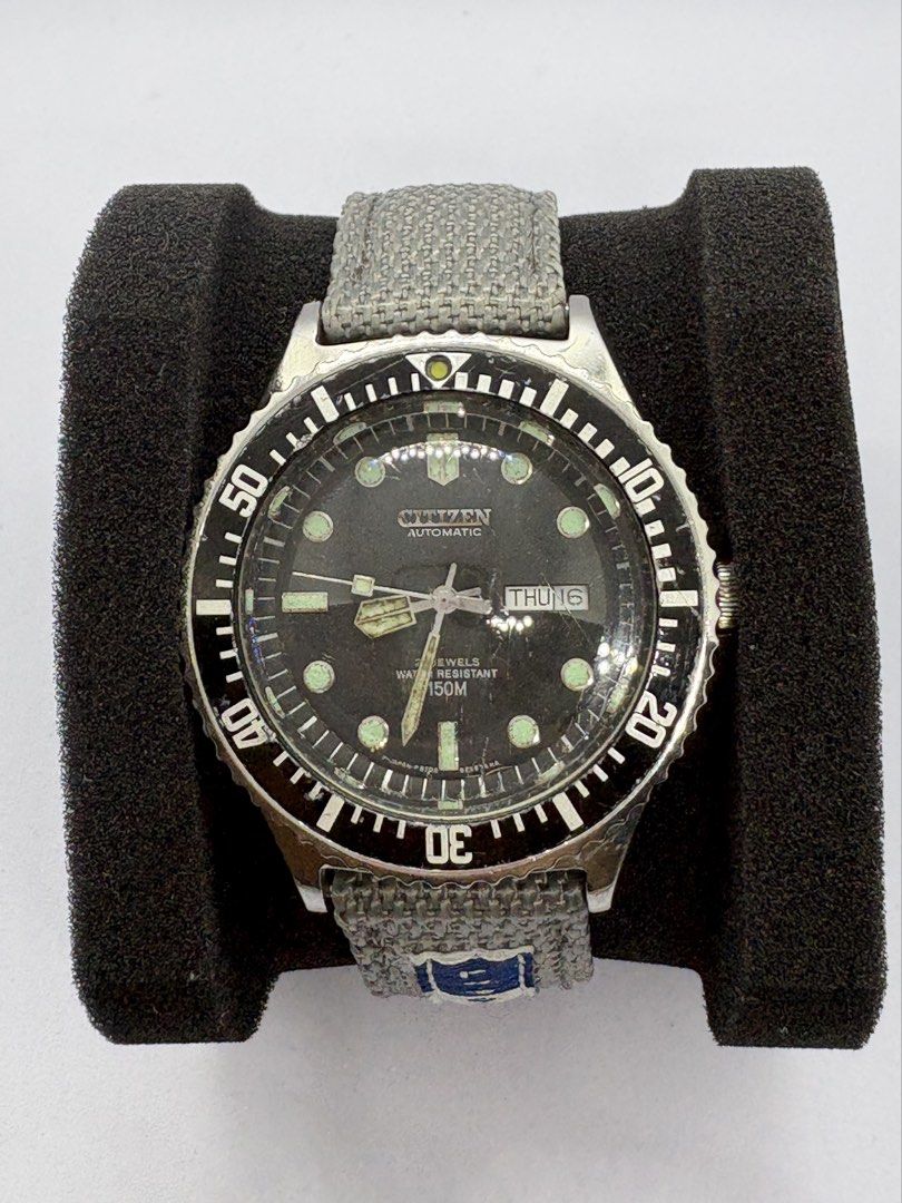 The iconic Citizen Paddle Hands 51-2273 (Category: Men's Watches) located in Quezon City. Submitted by rentoti (Listing ID 1459518430, Image 1). Description: This is a classic. A highly collectible vintage diver featuring the iconic signature paddle hands. Condition & Details: 100% all original head (dial, hands, bezel, case, and crown). Only the strap has been replaced with a comfortable grey fabric/textile strap. Keeps accurate time and functio