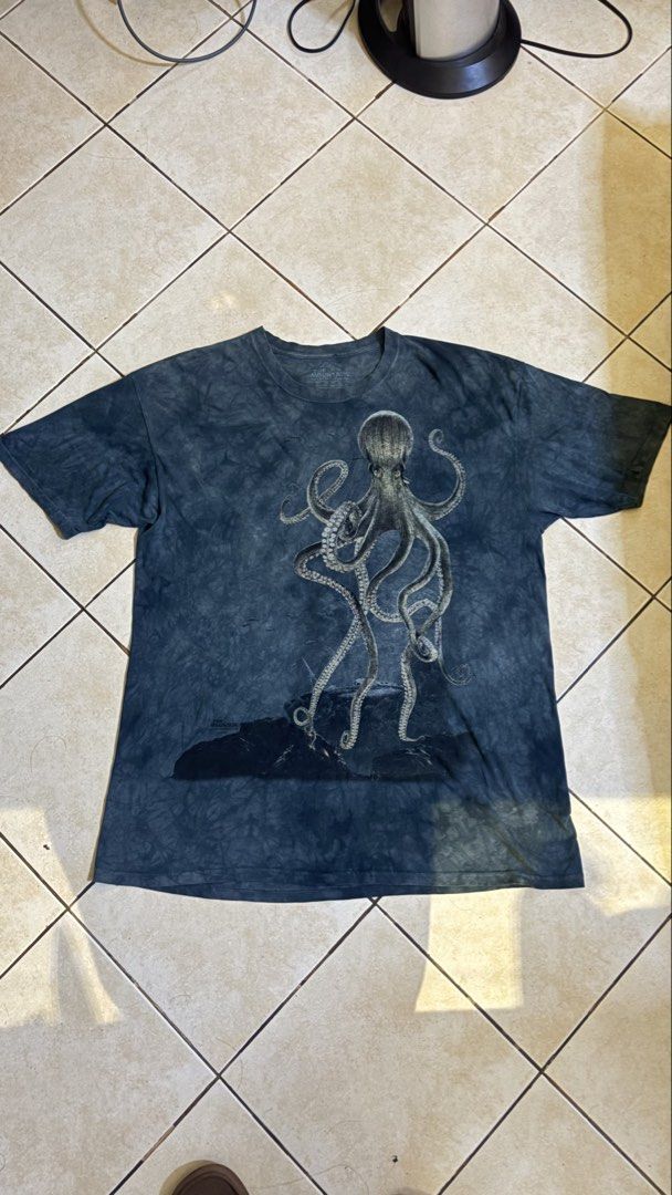 The Mountain (Category: Tshirts & Polo Shirts ) located in Manila. Submitted by thrifty_rick (Listing ID 1463449891, Image 1). Description: The Mountain-Octopus 2009 Issue: Pinhole Condition: Well used but in good condition. W25.5 L32 .