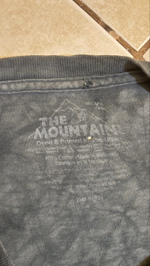 The Mountain (Category: Tshirts & Polo Shirts ) located in Manila. Submitted by thrifty_rick (Listing ID 1463449891, Image 2). Description: The Mountain-Octopus 2009 Issue: Pinhole Condition: Well used but in good condition. W25.5 L32 .