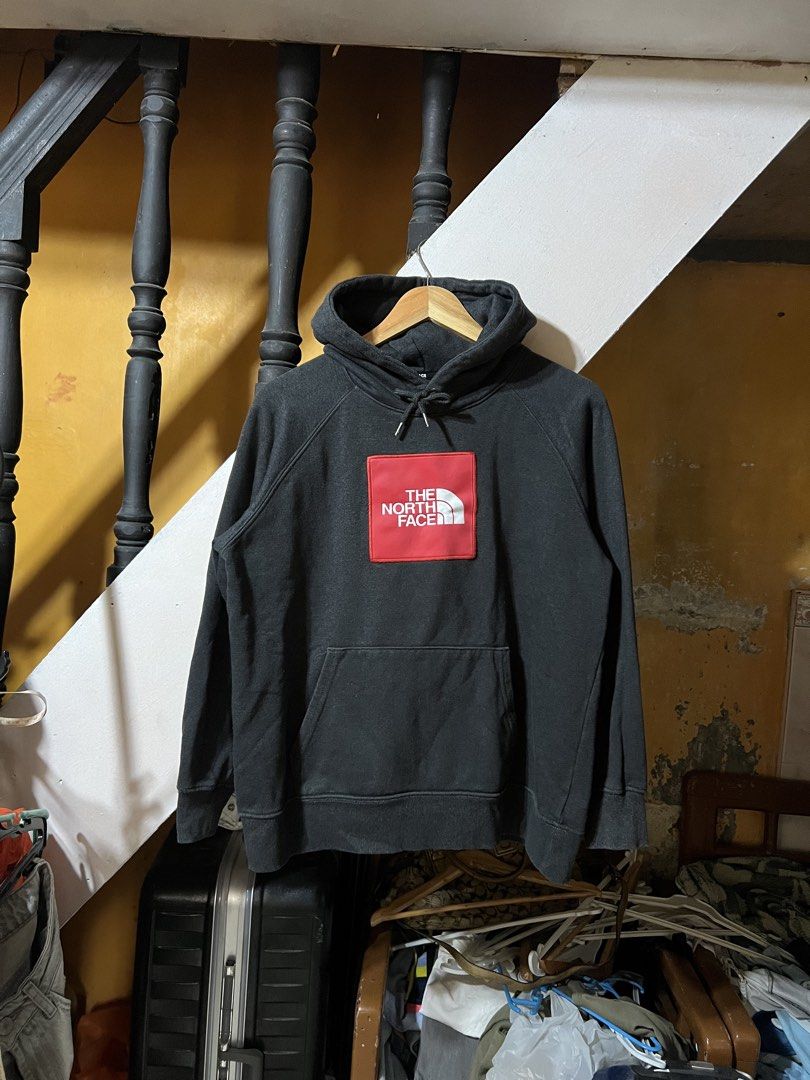 The North Face Grey Cotton Polyester Sweatshirt (Category: Coats, Jackets and Outerwear) located in Butuan. Submitted by nikthrift. (Listing ID 1463334830, Image 1). Description: - Brand: The North Face - Color: Grey - Material: Cotton and Polyester blend - Features: Iconic red logo patch on chest - Style: Comfortable, casual, great for layering.