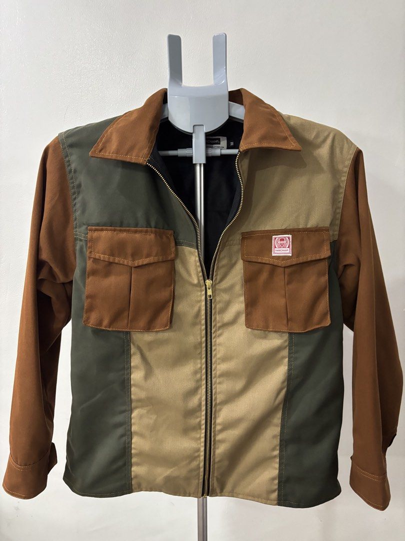 Think Champion Buccaneer Conquest, FOREST COLORWAY (Category: Coats, Jackets and Outerwear) located in Quezon City. Submitted by clutter_busters (Listing ID 1463441171, Image 1). Description: Think Champion Buccaneer Conquest zip down, FOREST COLORWAY - Used once. Good as new - Pit to pit: 22 inches - Length: 25.5 inches - RFS, decluttering - shipping Lalamove/J&T.