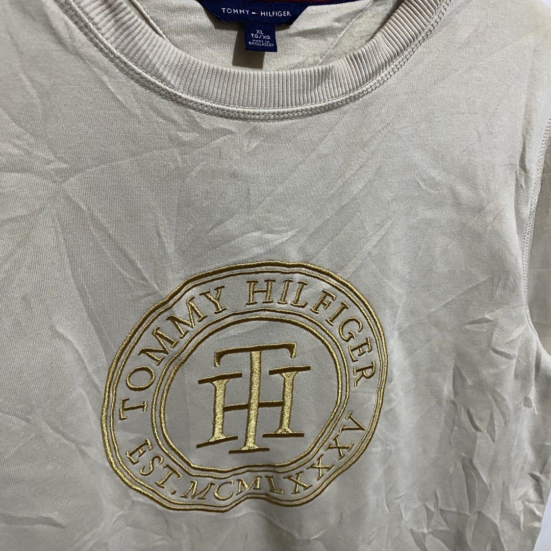 Tommy Hilfiger Cream Crewneck (Category: Coats, Jackets and Outerwear) located in Davao. Submitted by bangers01 (Listing ID 1463384643, Image 2). Description: .