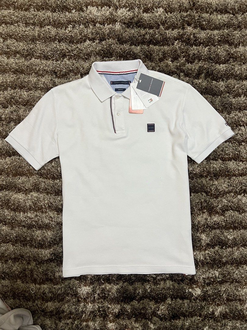 Tommy Hilfiger Original White Poloshirt (Category: Tshirts & Polo Shirts ) located in Manila. Submitted by actd_luxury (Listing ID 1463546798, Image 1). Description: L: 22x27.