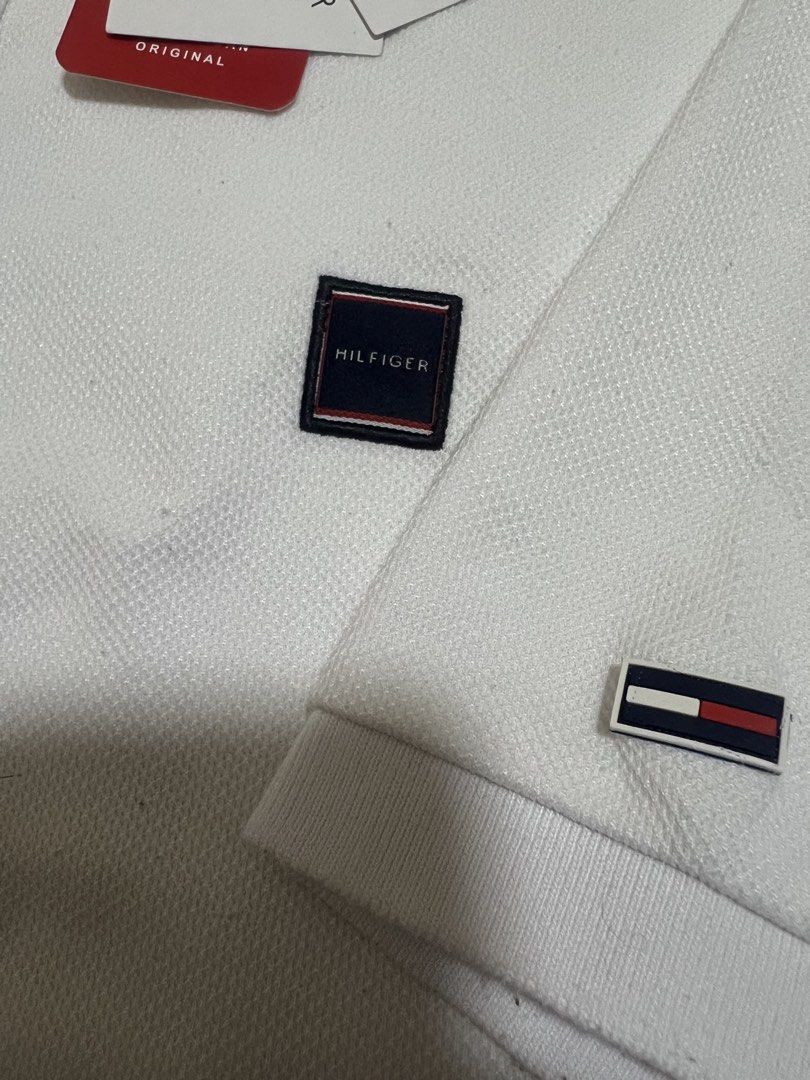 Tommy Hilfiger Original White Poloshirt (Category: Tshirts & Polo Shirts ) located in Manila. Submitted by actd_luxury (Listing ID 1463546798, Image 2). Description: L: 22x27.