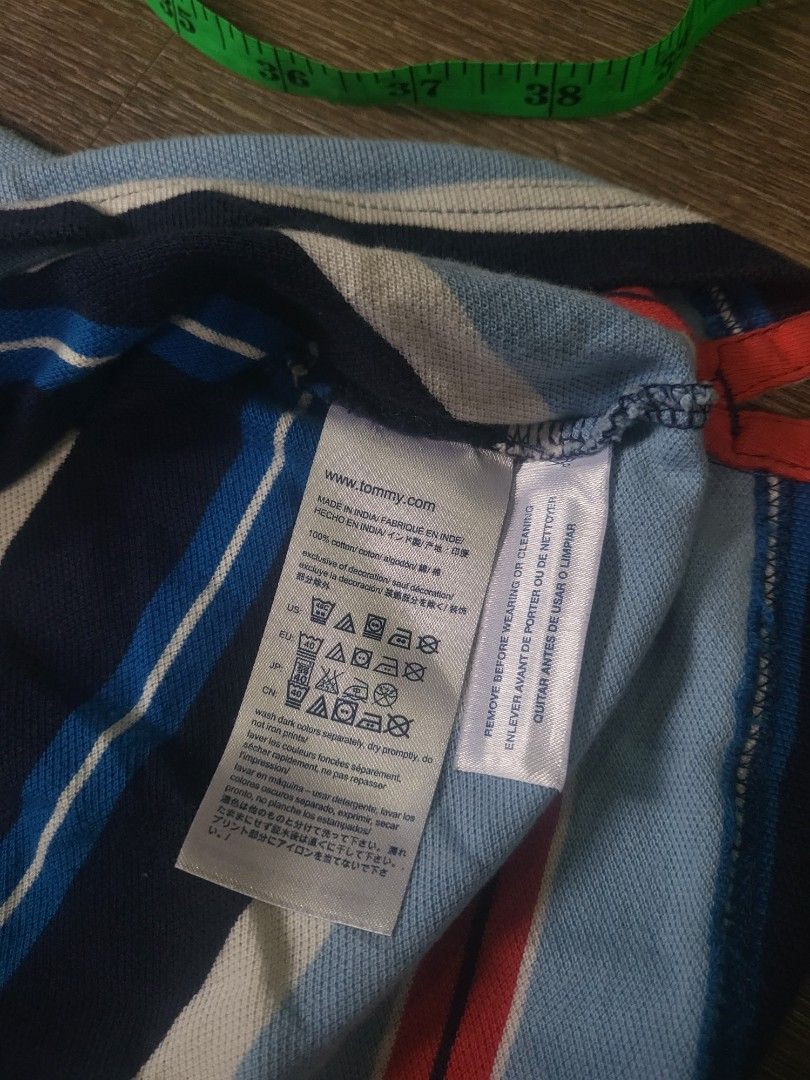 Tommy Hilfiger Polo Shirt (Category: Tshirts & Polo Shirts ) located in Quezon City. Submitted by w_shawnyyy (Listing ID 1463381160, Image 3). Description: Tommy Hilfiger Polo Shirt - Blue with Multicolor Stripes - No issues - Not Thrifted, personal clothes Length- 28.5in Chest- 19in Location: Near SM Fairview Shipping: Lalamove, Jnt (buyer shoulders sf) .