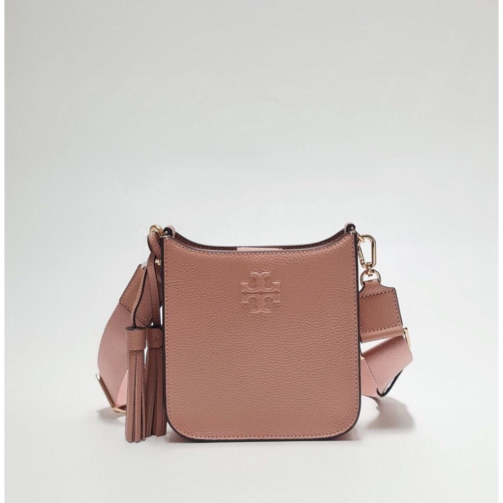 Tory burch (Category: Cross-body Bags) located in Baguio. Submitted by rheaanne07_2ndaccount (Listing ID 1463348759, Image 2). Description: Like new condition Missing tassle Orig Fits small wallet and phone And other small essentials .
