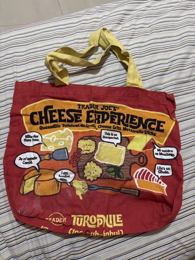 Trader Joe's Cheese Experience Tote Bag (Category: Tote Bags) located in Paranaque City. Submitted by mj.oha (Listing ID 1463409558, Image 1). Description: - Perfect for grocery shopping or everyday use - Shows some signs of wear.