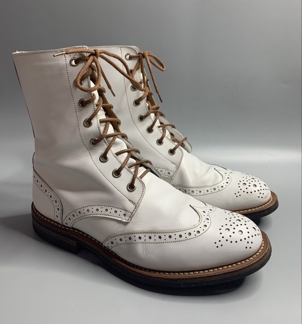 Tricker's Brouge Booots (Category: Boots) located in Binan City. Submitted by disqualified_but_undefeated (Listing ID 1463466460, Image 1). Description: Tricker's London Brouge Boots Mens Size- UK 7.5/ US 8.5 In Good Condition •Minimal Heel Drags •Dirts and Scratches Due to Usage Please Check Detailed Photos Posted For Your Reference Thankyou!!! •Tricker's White Leather Country Brogue Boots. •These iconic heavy wingtip boots are meticulously craf