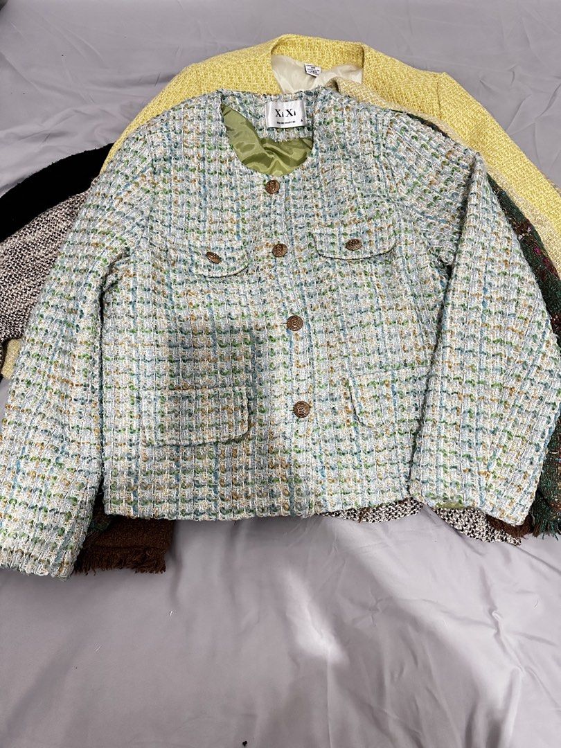 Tweed Jacket - Light Blue & Green Textured (Category: Coats, Jackets and Outerwear) located in Manila. Submitted by everythingsale101 (Listing ID 1463479813, Image 3). Description: - Light blue and green textured tweed jacket from XiXi. - Classic collarless design. - Button closures. - Two front pockets. - Fully lined with smooth green fabric. - Ideal for layering over tops or dresses. - Adds a pop of color and texture to any outfit. Fits up to L