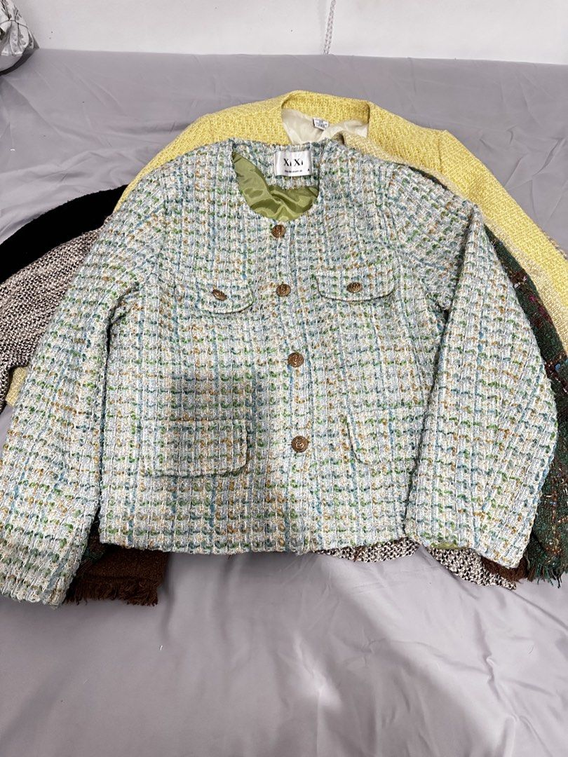 Tweed Jacket - Light Blue & Green Textured (Category: Coats, Jackets and Outerwear) located in Manila. Submitted by everythingsale101 (Listing ID 1463479813, Image 1). Description: - Light blue and green textured tweed jacket from XiXi. - Classic collarless design. - Button closures. - Two front pockets. - Fully lined with smooth green fabric. - Ideal for layering over tops or dresses. - Adds a pop of color and texture to any outfit. Fits up to L