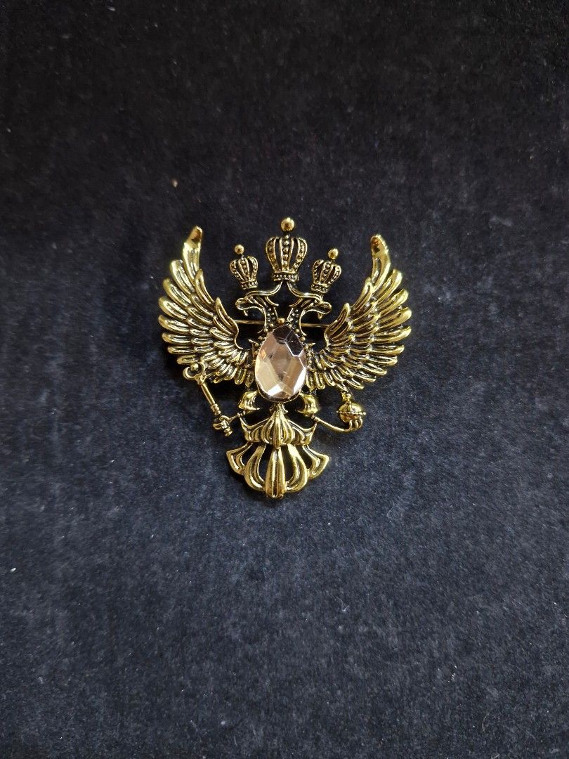 Twin Eagle Crest Brooch (Category: Brooches) located in Taguig. Submitted by mommaschoice (Listing ID 1463337559, Image 1). Description: Brand new Unisex use Adorned w/rhinestone Beautifully crafted design Lightweight won't damage the fabric Ships nationwide.