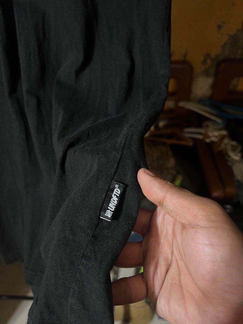 Undefeated Black Cotton T-Shirt Large (Category: Tshirts & Polo Shirts ) located in Butuan. Submitted by nikthrift. (Listing ID 1463334337, Image 3). Description: - Brand: Undefeated - Color: Black - Material: 100% Cotton - Features: Undefeated logo on tag, woven tag on side seam - Style: Comfortable, casual, everyday wear -with tiny pinhole sa back.