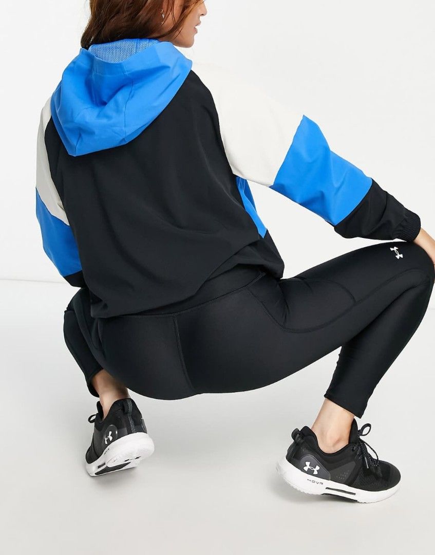Under Armour Colorblock Anorak Jacket (Category: Coats, Jackets and Outerwear) located in Valencia. Submitted by cabisaythriftshop (Listing ID 1463414051, Image 2). Description: Under Armour Training woven hooded jacket in blue colourblock Small-Medium 23L*21W As new.